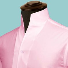 "High Open Collar Full Sleeves Shirt Tailor-Made On Order shirt 𝘈 𝘩𝘪𝘨𝘩 𝘤𝘰𝘭𝘭𝘢𝘳 𝘴𝘩𝘪𝘳𝘵 𝘪𝘴 𝘢 𝘤𝘭𝘢𝘴𝘴𝘪𝘤 𝘢𝘯𝘥 𝘵𝘪𝘮𝘦𝘭𝘦𝘴𝘴 𝘴𝘵𝘺𝘭𝘦 𝘵𝘩𝘢𝘵 𝘢𝘥𝘥𝘴 𝘢 𝘵𝘰𝘶𝘤𝘩 𝘰𝘧 𝘴𝘰𝘱𝘩𝘪𝘴𝘵𝘪𝘤𝘢𝘵𝘪𝘰𝘯 𝘵𝘰 𝘢𝘯𝘺 𝘰𝘶𝘵𝘧𝘪𝘵. 𝘛𝘩𝘪𝘴 𝘴𝘵𝘺𝘭𝘦 𝘧𝘦𝘢𝘵𝘶𝘳𝘦𝘴 𝘢 𝘤𝘰𝘭𝘭𝘢𝘳 𝘵𝘩𝘢𝘵 𝘴𝘵𝘢𝘯𝘥𝘴 𝘶𝘱 𝘢𝘯𝘥 𝘦𝘯𝘤𝘪𝘳𝘤𝘭𝘦𝘴 𝘵𝘩𝘦 𝘯𝘦𝘤𝘬, 𝘱𝘳𝘰𝘷𝘪𝘥𝘪𝘯𝘨 𝘢 𝘳𝘦𝘧𝘪𝘯𝘦𝘥 𝘢𝘯𝘥 𝘱𝘰𝘭𝘪𝘴𝘩𝘦𝘥 𝘭𝘰𝘰𝘬. 𝘐𝘵'𝘴 𝘢 𝘷𝘦𝘳𝘴𝘢𝘵𝘪𝘭𝘦 𝘱𝘪𝘦𝘤𝘦 𝘰𝘧 𝘤𝘭𝘰𝘵𝘩𝘪𝘯𝘨 𝘵𝘩𝘢𝘵 𝘤𝘢𝘯 𝘣𝘦 𝘸𝘰𝘳𝘯 𝘸𝘪𝘵𝘩 𝘢 𝘴𝘶𝘪𝘵 𝘧𝘰𝘳 𝘧𝘰𝘳𝘮𝘢𝘭 𝘰𝘤𝘤𝘢𝘴𝘪𝘰𝘯𝘴 𝘰𝘳 𝘥𝘳𝘦𝘴𝘴𝘦𝘥 𝘥𝘰𝘸𝘯 𝘸𝘪𝘵𝘩 𝘫𝘦𝘢𝘯𝘴 𝘧𝘰𝘳 𝘢 𝘤𝘢𝘴𝘶𝘢𝘭 𝘭𝘰𝘰𝘬. 𝘛𝘩𝘦 𝘩𝘪𝘨𝘩 𝘤𝘰𝘭𝘭𝘢𝘳 𝘢𝘭𝘴𝘰 𝘰𝘧𝘧𝘦𝘳𝘴 𝘢𝘥𝘥𝘪𝘵𝘪𝘰𝘯𝘢𝘭 𝘤𝘰𝘷𝘦𝘳𝘢𝘨𝘦 𝘢𝘯𝘥 𝘱𝘳𝘰𝘵𝘦𝘤𝘵𝘪𝘰𝘯 𝘢𝘨 Collared Shirt With Covered Buttons For Daywear, Classic Tops With Stand Collar And Button Closure, Classic Stand Collar Tops With Buttons, Classic Stand Collar Top With Button Closure, Fitted Shirt With Stand Collar And Button Closure, Classic Top With Stand Collar And Button Closure, Semi-formal Tops With Spread Collar And Covered Buttons, Classic Summer Shirt With Stand Collar, Elegant Fitted Pink Dress Shirt