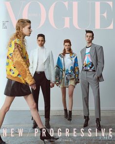 three models are walking on the cover of a magazine