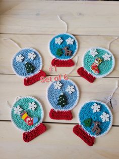 four crocheted ornaments with snowflakes on them