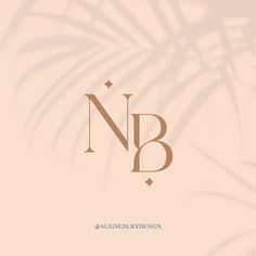 the letter nb is surrounded by palm leaves and an elegant monogrammed design