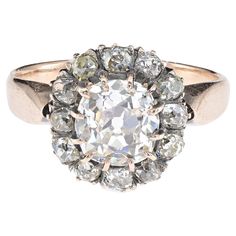 an antique diamond cluster ring,