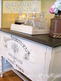 an antique buffet table with glassware on top and the words annie sloan's chalk paint