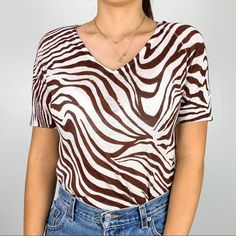 "Kara Top" By Acrobat. Features Brown & White Zebra Print All Over Pattern, V-Neck Line, Slips On Over Head Style, Short Sleeves, 100% Linen Fabric, Knit Construction, Semi Sheer, & Full Length. Size Women's Small. Approx Measurements (Laid Flat)- Bust: 18.5 In Length: 24 In In New Condition With Tags. No Flaws. Tags: Animal Print Lightweight Sweater Knitted Sheer Blouse Top T-Shirt Boho Bohemian Festival Neutral Staple Piece Minimal Patterned Holiday Gift Christmas Gift Casual Zebra Print Tops For Spring, White Zebra Print Tops For Summer, Spring Zebra Print Stretch Top, Casual Stretch Zebra Print Top, Spring Stretch Zebra Print Top, White Zebra Print Casual Tops, Spring Zebra Print V-neck Top, Head Style, All Over Pattern