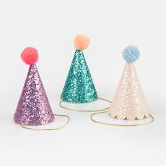 You can never have too much glitter when it's party time! Let your guests shimmer and shine with these mini party hats in jewel-like colors. The complementary pompoms on top add fun to the look. Mini Party Hats, Party Supply Kits, Wedding Tableware, Balloon Kits, Halloween Tableware, Wedding Congratulations, Birthday Cake With Candles, 4th Of July Celebration, Blue Neon