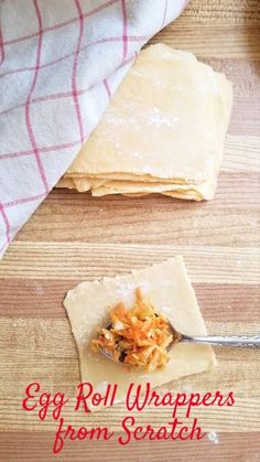 an egg roll wrapper is sitting on a cutting board