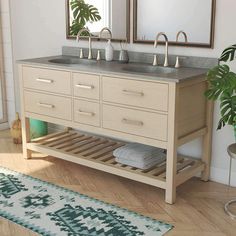 a bathroom vanity with two sinks and mirrors on the wall next to a potted plant