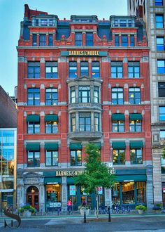 a large red brick building with many windows