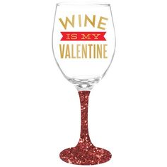 a wine glass with the words wine is my valentine written in gold glitter on it