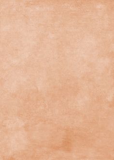 an orange and beige background with some stains