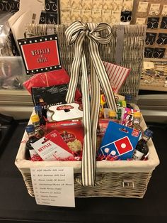 a gift basket filled with snacks and condiments