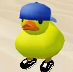 a yellow bird with a blue hat and tennis shoes on it's feet is standing in the snow