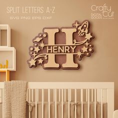 a wooden sign that says i is for henry in front of a baby's crib