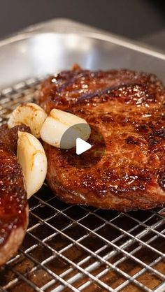 the steak is cooking on the grill and ready to be cooked