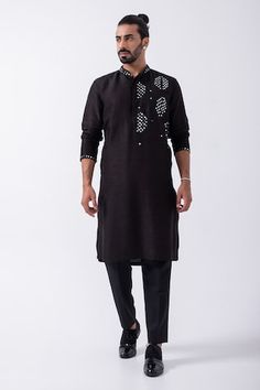 Black kurta with mirror embellished patterns. Comes with pyjama. - Aza Fashions Designer Black Cotton Sherwani, Black Kurta With Gota Work For Eid, Black Cotton Sets With Mirror Work, Black Mirror Work Kurta For Men, Luxury Black Kurta With Embroidered Border, Black Embroidered Cotton Sherwani, Black Kurta With Embroidered Border, Ceremonial Black Kurta With Naqshi Detailing, Black Embroidered Jamawar Kurta