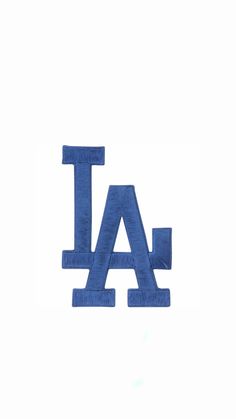 the los angeles dodgers logo is shown on a white background in this image, it appears to be made out of felt