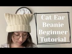 a woman wearing glasses and a knitted cat hat with text overlay that reads, cat ear beanie beginner tutor