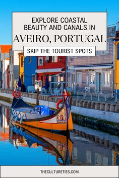 a boat floating on top of a body of water next to tall buildings and the words explore coastal beauty and canals in avero, portugal skip the tourist spots