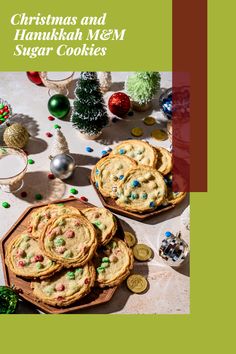 christmas and hanukkah m & m sugar cookies on a table with ornaments