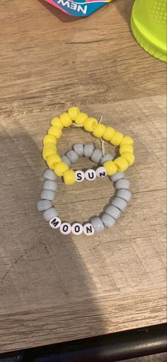 two bracelets that say mom and son on them