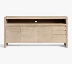 the sideboard is made from wood and has two drawers, one with an open door