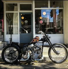 a motorcycle parked in front of a building