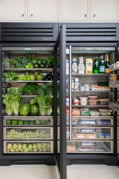 two refrigerators filled with different types of food and drinks in a kitchen, one is open to the other side