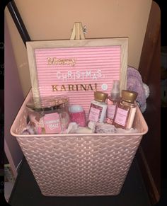 a pink basket filled with lots of items