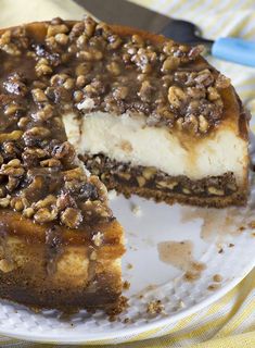 a piece of cheesecake on a plate with a fork