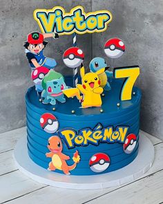 a birthday cake with pokemon characters on it