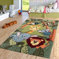 PRICES MAY VARY. SIZE: 32 x 60 inches | COLOR: Green / Multicolor COMPOSITION: Machine Made / 100% Polypropylene / Backing: Jute / Pile-Height: 0.47'' / The Power Loomed construction adds durability to this Rug HIGHLIGHTS: Cute and Charming Jungle Animal Motifs / kid and pet friendly / soft & robust / Suitable for Underfloor heating Free from harmful Substances - This Product is certified according to Oeko-Tex Standard 100 Easy to clean - we recommend spot cleaning with a mild detergent and regu Jungle Rug, Rug For Nursery, Kids Rug, Childrens Rugs, Nursery Rugs, Underfloor Heating, Jungle Animals, Green Rug, Wall Color