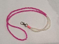 A hand-crafted pink and clear beaded lanyard for those in the healthcare and education field. Cheap Pink Beaded Lanyards, Pink Lanyard, Beaded Lanyard, Badge Holders Lanyard, Badge Holders, Lanyard, Beauty Book, Hand Crafted, Roses