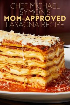 a stack of lasagna stacked on top of each other with sauce and cheese