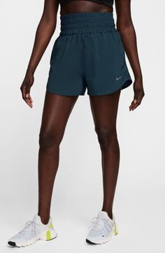 Gear up for your run with these lightweight high-waisted shorts constructed from moisture-wicking fabric and designed with brief lining for extra support. 3" inseam; 26" leg opening; 13 1/2" front rise; 17" back rise (size Medium) Elastic waist Side-seam pockets Dri-FIT moisture-wicking technology Brief liner 100% polyester Machine wash, tumble dry Imported Stretch Shorts For Marathon, Functional Bottoms With Built-in Shorts For Marathon, Nike Sporty High-waisted Athletic Shorts, Moisture-wicking Stretch Athletic Shorts For Marathon, Stretch Moisture-wicking Athletic Shorts For Marathon, Stretch Activewear Shorts For Running, Go-dry High-waisted Running Shorts, Go-dry High-waisted Shorts For Running, Short Bottoms With Built-in Shorts For Marathon