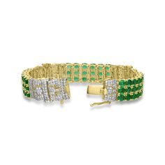 Elevate your style with this extraordinary bracelet. Featuring a stunning combination of 19.40 carats of vibrant emeralds and 4.95 carats of dazzling white diamonds, set in exquisite 14K two-tone metal weighing 43.95 grams, it's a true masterpiece of luxury and sophistication. Green Diamond Tennis Bracelet For Formal Occasions, Formal Green Bracelets With Diamond Accents, Formal Green Diamond Tennis Bracelet, Green Bracelets With Diamond Accents For Formal Occasions, Luxury Green Tennis Bracelet For Formal Events, Luxury Green Cubic Zirconia Bracelets, Luxury Green Emerald Diamond Bracelet, Luxury Green Tennis Bracelet, January Birthstone Jewelry