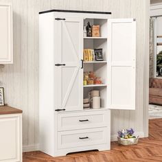 a white cabinet with doors and drawers in a room next to a brown couch on the floor