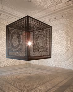 an image of a room that is made up of squares and circles with the light shining through