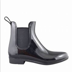 A Shiny, Waterproof Finish On A Classic Chelsea Boot Silhouette Makes Sure Any Rainy Day Is Stylish From Storm By Cougar. Round Toe. Dual Elastic Side Gores. Pull On Style With Back Pull Tab. Lightly Padded, Removable Insole. Waterproof. Manmade And Textile Upper. Manmade Sole. Approx: 6” Shaft Height, 10” Opening Circumference, 1” Heel Height Color: Black Size 9 Box Lid Not Included! **Brand New! With Tags & Box** Cougar Storm Boots, Cougar Boots, Waterproof Suede Boots, Boot Silhouette, Chelsea Rain Boots, Rain Shoes, Waterproof Winter Boots, Chelsea Ankle Boots, Grey Boots