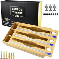 the bamboo storage box is filled with different tools