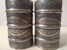 This is a pair of vintage high quality silver Berber open cuff bracelet from Libya with Hallmarks. Simple tribal elegance at its best! The beautiful engravings and repouss decorations form the show the popular Berber sun motif. It is additionally adorned with decorative stampings/punches. Width : 11,4 cm (4,5 inches) Inner Diameter : 6,7 cm (2,6 inches) Weight (Pair) : 368 g Traditional Stamped Cuff Bracelet For Formal Wear, Traditional Stamped Cuff Bracelet For Formal Occasions, Silver Cuff Bracelets, Funky Jewellery, Indian Antiques, Sun Motif, Moroccan Jewelry, Open Cuff Bracelet, Boho Accessories