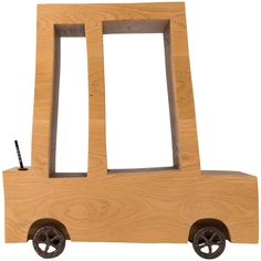 a wooden toy car with wheels and two windows