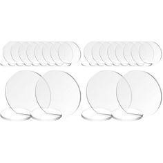 a set of six clear plates on a white background