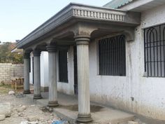 an old building with columns and windows