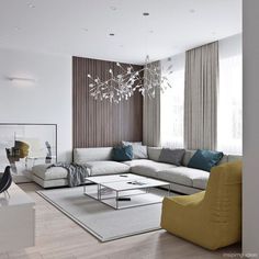 a living room filled with furniture and a chandelier