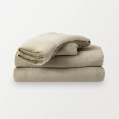 Folded Dry Sage sheet set on a white background. Dry Sage, Berkshire Blanket, California King, Sophisticated Look, Fitted Sheet, Sheet Sets, A Fan, Product Features, Feel Like