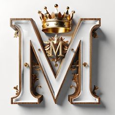 the letter m has a crown on top of it