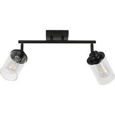 three light black track fixture with clear glass shades on the bottom and two lights in the middle