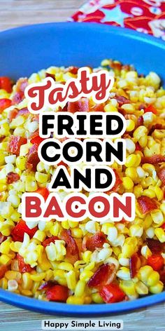 a blue bowl filled with corn and bacon