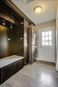 a washer and dryer in a large room