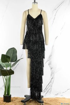 OrcaJump - Elegant Spaghetti Strap Evening Dress with Asymmetrical Tassel Detailing in Solid Black Party Dress With Fringe And Asymmetrical Hem, Sleeveless Evening Maxi Dress With Tassels, Evening Sleeveless Maxi Dress With Tassels, Fringe Dress With Asymmetrical Hem For Party, Sleeveless Fringe Maxi Dress For Evening, Sleeveless Fringe Maxi Dress For Night Out, Sleeveless Fringe Maxi Dress For Party, Black Sleeveless Dresses With Tassels, Sleeveless Black Dress With Tassels