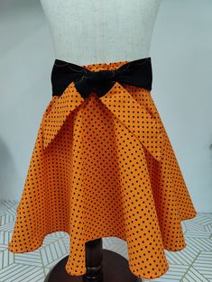 Cute circle skirt  for your cute little one . This can be the perfect skirt for Halloween pair with a black top and you are all set for Halloween. Apart from Halloween it can be worn for any occasion of choice.  This  POLKA DOT skirt has ELASTIC waistband which makes room for a   bit  of growing .  I enjoy making this cute skirt for your  cute little one  since i don't have one of my own.  Fabric ---- Cotton Waistband-----Elastic. Size---- Made to order/ Custom. Girls Tulle Skirt, Halloween Skirt, Girls Skirts, Toddler Halloween, Cute Skirt, Your Cute, Polka Dot Skirt, Dot Skirt